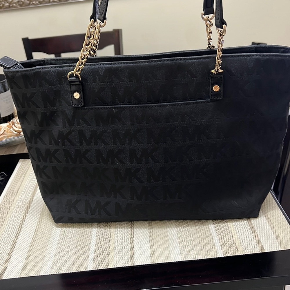 Black medium sized Michael Kors bag